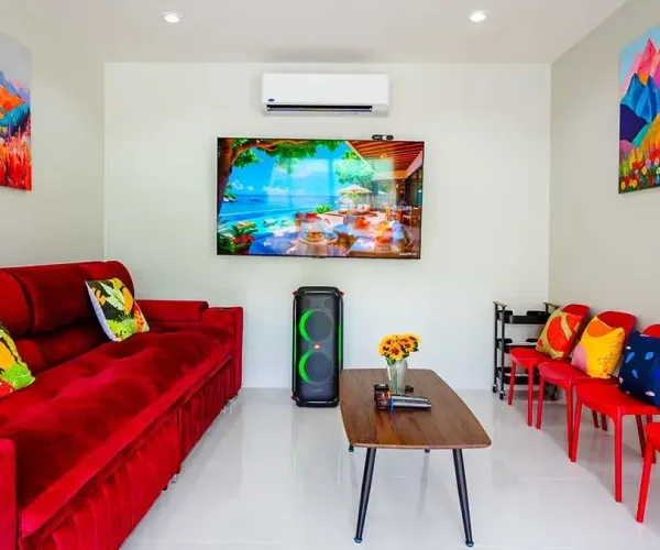 karaoke living room with smart tv and sofa at love u pool villa hua hin